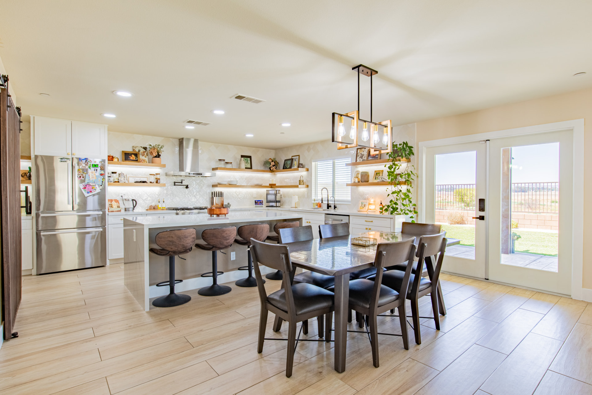 Kitchen and dining area with patio doors to the backyard